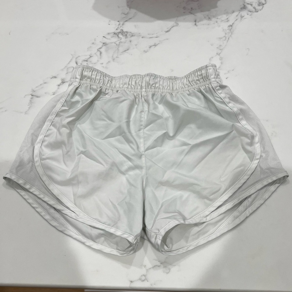White Nike shorts